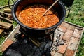 Traditional Hungarian goulash soup in the cauldron Royalty Free Stock Photo