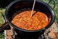 Traditional Hungarian goulash soup in the cauldron Royalty Free Stock Photo