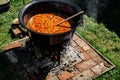 Traditional Hungarian goulash soup in the cauldron Royalty Free Stock Photo