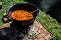 Traditional Hungarian goulash soup in the cauldron Royalty Free Stock Photo