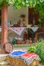 Traditional Hungarian objects exhibited on one home porch