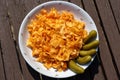 Traditional hungarian potato pasta in hungarian krumplis tÃÂ©szta with pickles