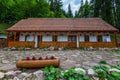 Traditional hungarian wooden guest house near roadside.