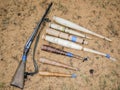 Traditional hunting pipes for luring deer in the mating season and an old gun Royalty Free Stock Photo