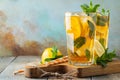 Traditional iced tea with lemon and ice in tall glasses on a wooden rustic table. With copy space Royalty Free Stock Photo