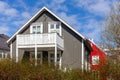 Traditional Icelandic residential ironclad house with gable roofs