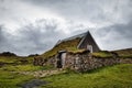 traditional icelandic turf house at hveravelir, cloudy sky, green meadow Royalty Free Stock Photo