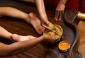 Traditional indian ayurvedic oil foot massage Royalty Free Stock Photo