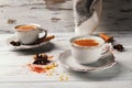Two cups of traditional Indian masala tea. Spicy tea with aromatic spices and milk Royalty Free Stock Photo