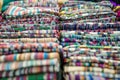 Traditional Indian fabric store. Colorful traditional indian hindi textile fabric wrap scarfs