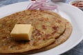 Traditional Indian food Aloo paratha or potato stuffed flat bread. served with pickle Royalty Free Stock Photo