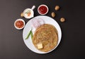 Traditional Indian food Aloo paratha or potato stuffed flat bread. served with pickle Royalty Free Stock Photo