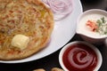 Traditional Indian food Aloo paratha or potato stuffed flat bread. served with pickle Royalty Free Stock Photo