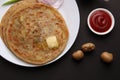 Traditional Indian food Aloo paratha or potato stuffed flat bread. served with pickle Royalty Free Stock Photo