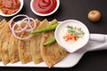 Traditional Indian food Aloo paratha or potato stuffed flat bread. served with pickle Royalty Free Stock Photo