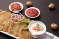 Traditional Indian food Aloo paratha or potato stuffed flat bread. served with pickle Royalty Free Stock Photo