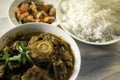 A Traditional Indian Lamb Curry with rice and salad Royalty Free Stock Photo