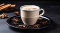 Traditional indian masala chai tea with milk and spices in a cup on a modern kitchen table Royalty Free Stock Photo
