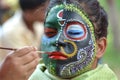 Traditional Indian painting designs on Face