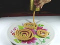 Traditional Indian snack chakli Making. Raw Chakli Royalty Free Stock Photo