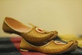 Traditional indian wedding ceremony : Groom wedding shoes or mojadi Royalty Free Stock Photo