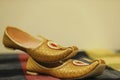 Traditional indian wedding ceremony : Groom wedding shoes or mojadi Royalty Free Stock Photo