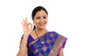 Traditional Indian Young woman making OK sign Royalty Free Stock Photo