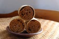 steamed apem cake with palm sugar flavor wrapped in a bamboo sleeve