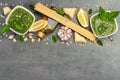 Traditional ingredients for the preparation of classic Italian pasta. Dry spaghetti, basil pesto Royalty Free Stock Photo