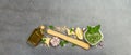 Traditional ingredients for the preparation of classic Italian pasta. Dry spaghetti, basil pesto Royalty Free Stock Photo