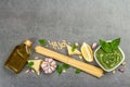 Traditional ingredients for the preparation of classic Italian pasta. Dry spaghetti, basil pesto Royalty Free Stock Photo