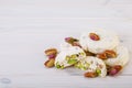 Traditional Iranian and Persian pieces of white nougat dessert sweet candies Gaz with Pistachio Royalty Free Stock Photo