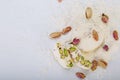 Traditional Iranian and Persian pieces of white nougat dessert sweet candies Gaz with Pistachio Royalty Free Stock Photo