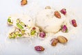 Traditional Iranian and Persian pieces of white nougat dessert sweet candies Gaz with Pistachio Royalty Free Stock Photo