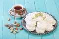 Traditional Iranian and Persian pieces of white nougat dessert sweet candies Gaz with Pistachio nuts Royalty Free Stock Photo