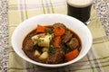 Traditional irish beef and guinness stew with carrot and fresh p