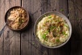 Traditional Irish dish colcannon, mashed potatoes with cabbage and green onions, on top of crispy fried cabbage topping with nuts Royalty Free Stock Photo