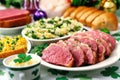 Traditional irish feast with corned beef, cabbage, and fresh bread Royalty Free Stock Photo