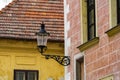 Traditional iron lamp lantern on a wall of historic buildings in the Old Town of Bratislava, Slovakia Royalty Free Stock Photo