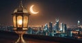 Traditional Islamic lanterns stand against the backdrop of a night city and starry sky with moon. Signifies the coming of Ramadan