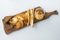 Traditional Israeli hummus with bread chips on the board.