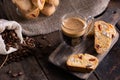 Traditional Italian almond biscuits biscotti served on a wooden board with a cup of aromatic coffee Royalty Free Stock Photo