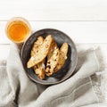Traditional Italian almond cantuccini cookies and sweet wine Vin Santo. Royalty Free Stock Photo