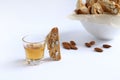 Traditional Italian almond cookies and sweet wine. Royalty Free Stock Photo