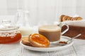 Traditional Italian Breakfast. Apricot Jam and Butter on Rusks or Fette Biscottate Royalty Free Stock Photo