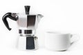 Traditional Italian coffee maker Moka pot and cup on white background Royalty Free Stock Photo