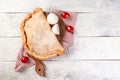 Traditional Italian cuisine. Pizza, pita, Calzone - Stuffed Pizza with Tomato, Mozzarella and Ham. background image, copy space