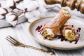 Traditional italian dessert cannoli siciliani on plate Royalty Free Stock Photo