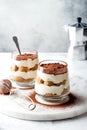 Traditional Italian dessert tiramisu in a glass. Royalty Free Stock Photo