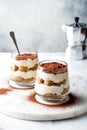 Traditional Italian dessert tiramisu in a glass. Royalty Free Stock Photo